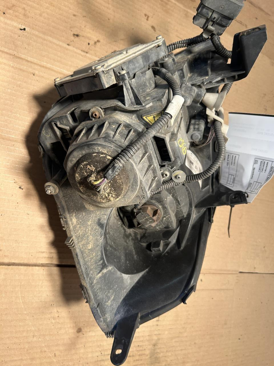 Headlight Assembly from a 2007 Cadillac, right side, photo 3