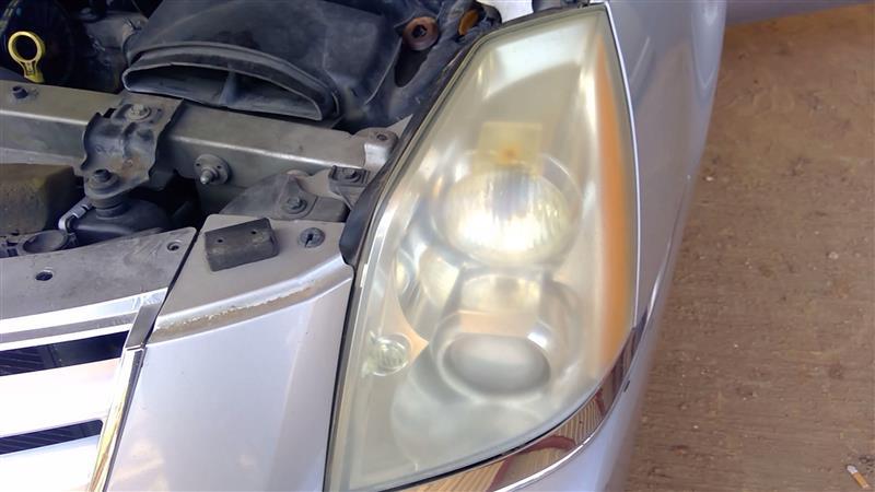 Headlight Assembly from a 2007 Cadillac, left side, photo 1