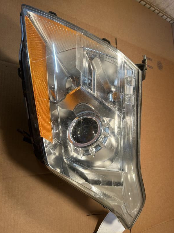 Headlight Assembly from a 2012 Cadillac SRX, right side, photo 1