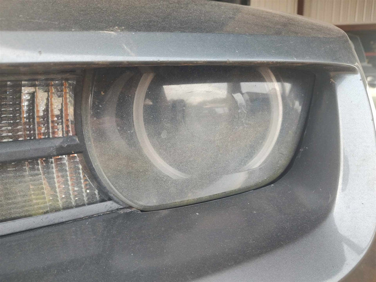 Headlight Assembly from a 2011 Chevrolet Camaro, left side, photo 1