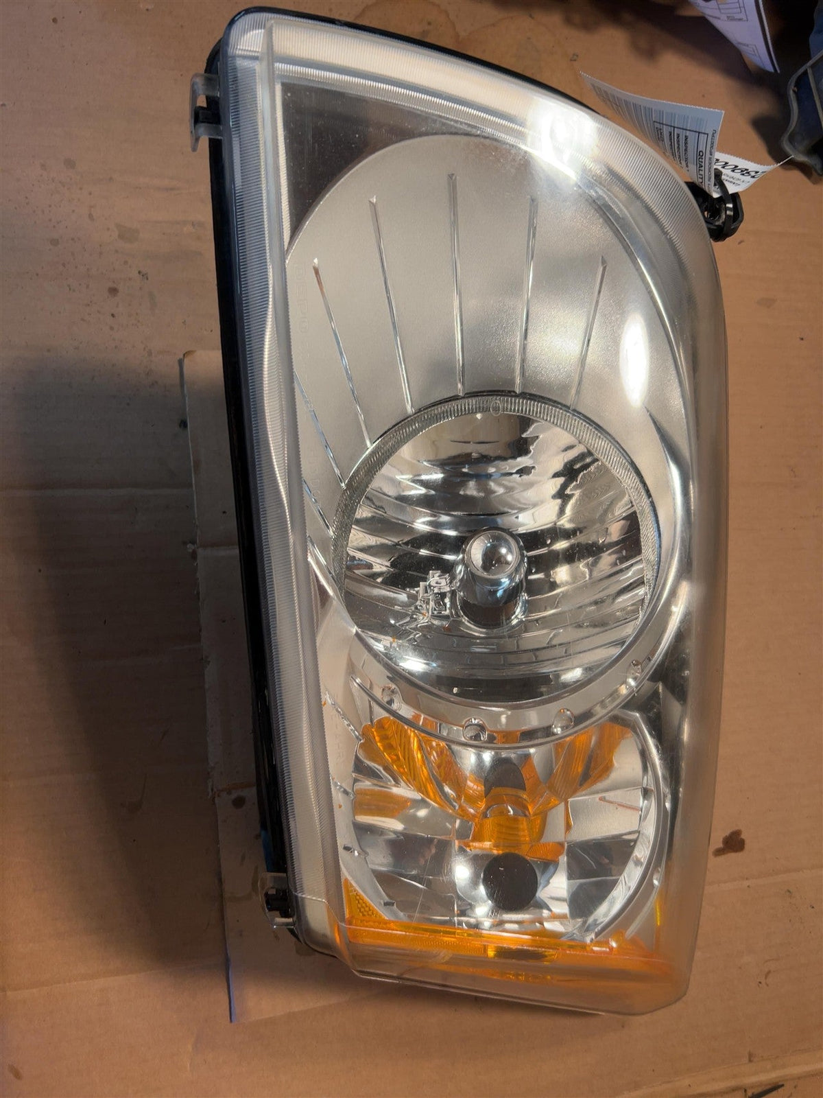 Headlight Assembly from a 2010 Dodge Caliber, left side, photo 2