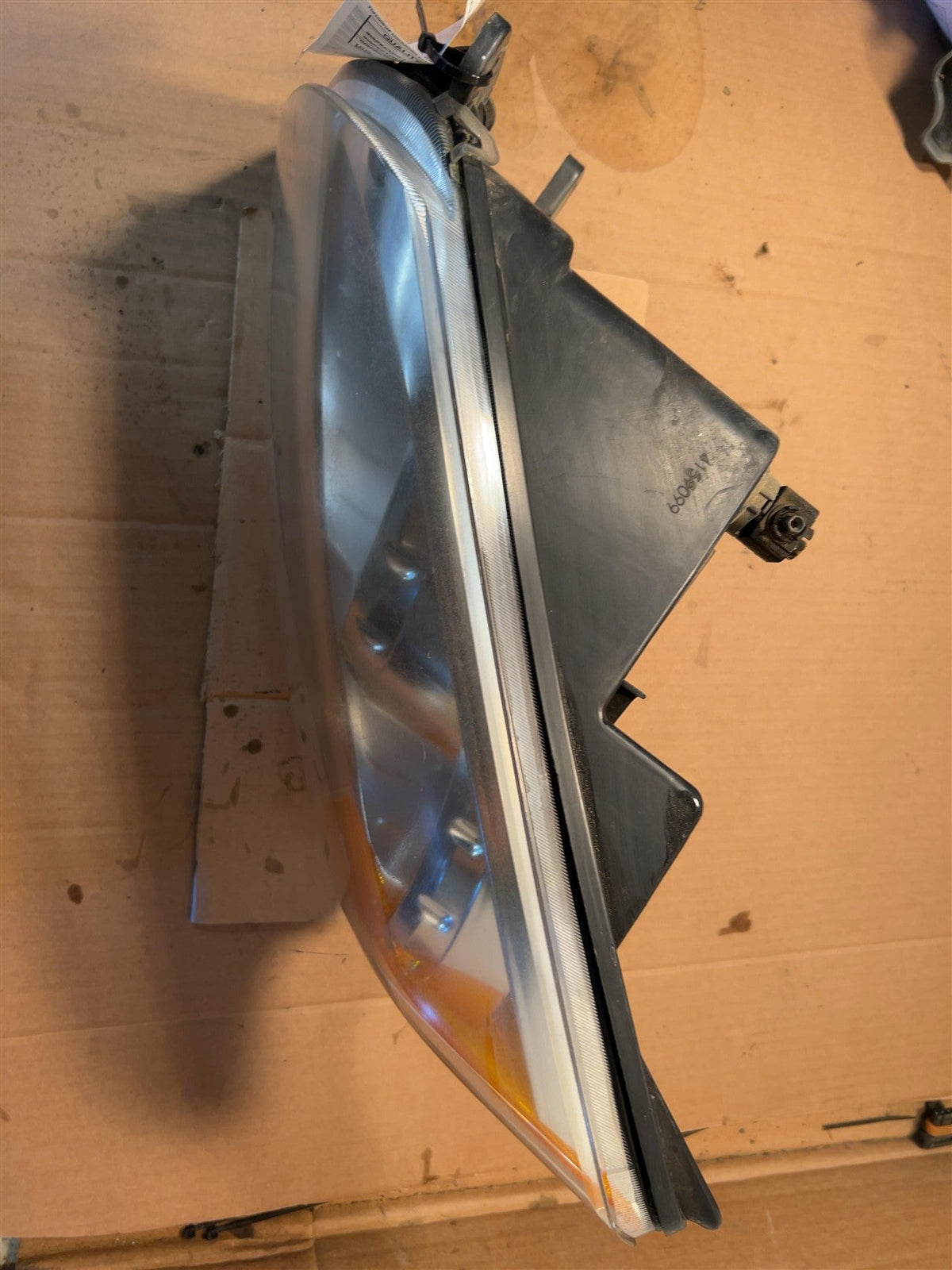 Headlight Assembly from a 2010 Dodge Caliber, left side, photo 3