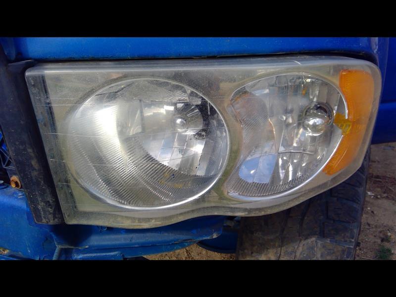 Headlight Assembly from a 2004 Dodge Ram 1500, left side, photo 1
