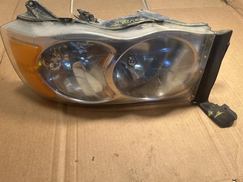 Headlight Assembly from a 2004 Dodge Ram 1500, left side, photo 2