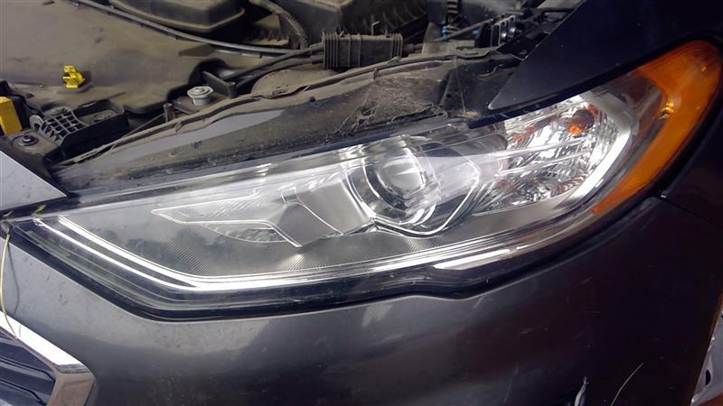 Headlight Assembly from a 2020 Ford Fusion, left side, photo 1