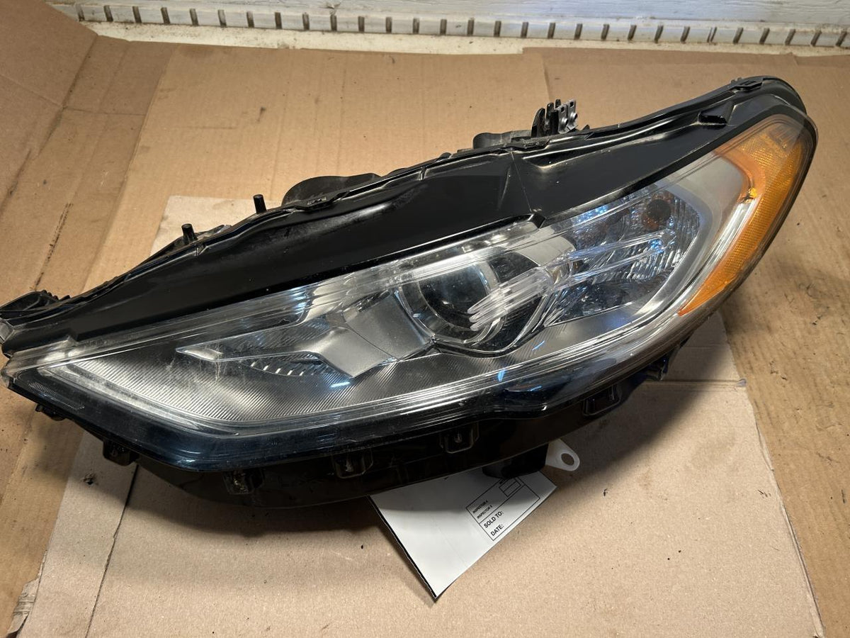 Headlight Assembly from a 2020 Ford Fusion, left side, photo 2