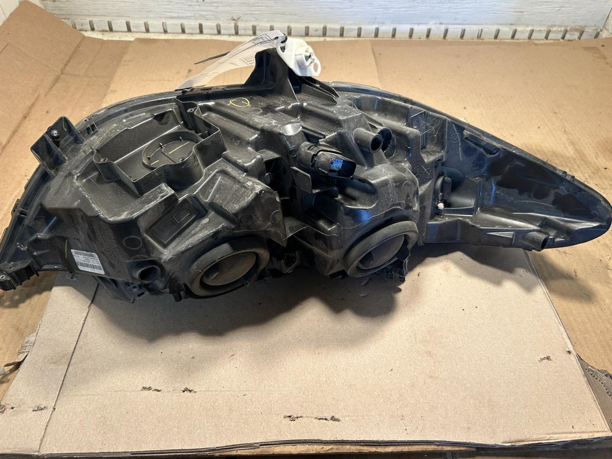 Headlight Assembly from a 2020 Ford Fusion, left side, photo 3