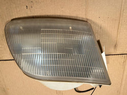 Headlight Assembly from a 1997 Ford F-150, right side, photo 1