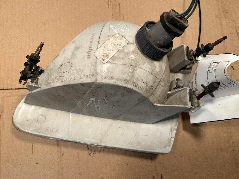 Headlight Assembly from a 1997 Ford F-150, right side, photo 2