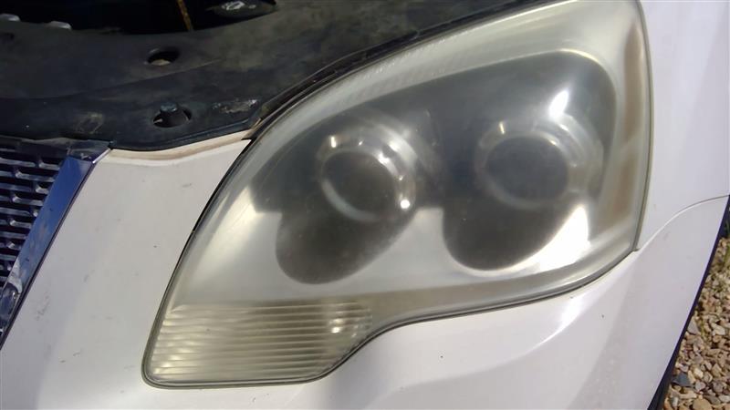 Headlight Assembly from a 2008 GMC Acadia, left side, photo 1