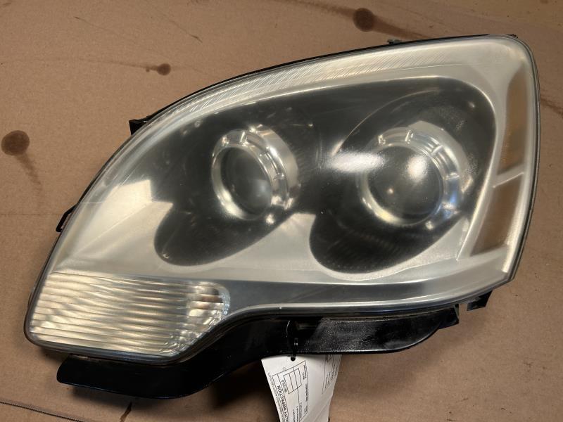 Headlight Assembly from a 2008 GMC Acadia, left side, photo 2