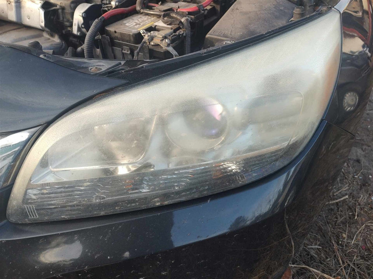 Headlight Assembly from a 2015 Chevrolet Malibu, left side, photo 1
