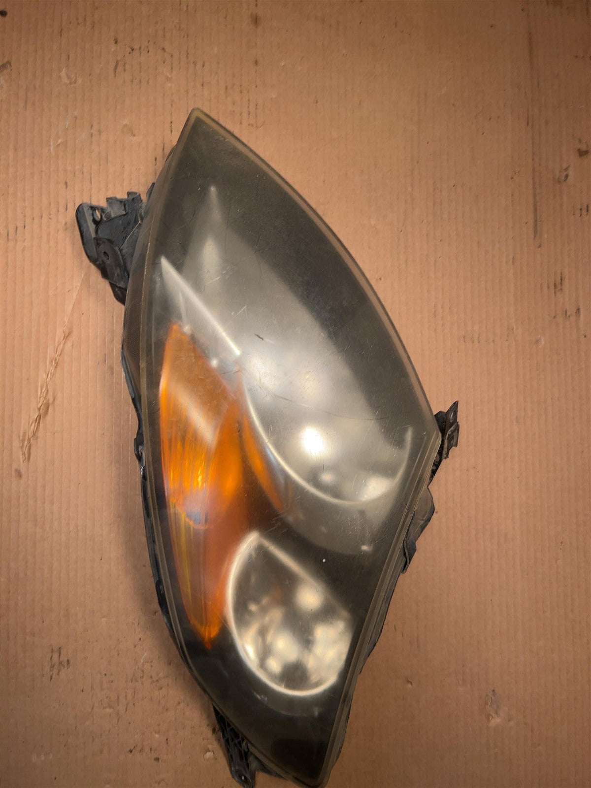 Headlight Assembly from a 2015 Chevrolet Malibu, left side, photo 3