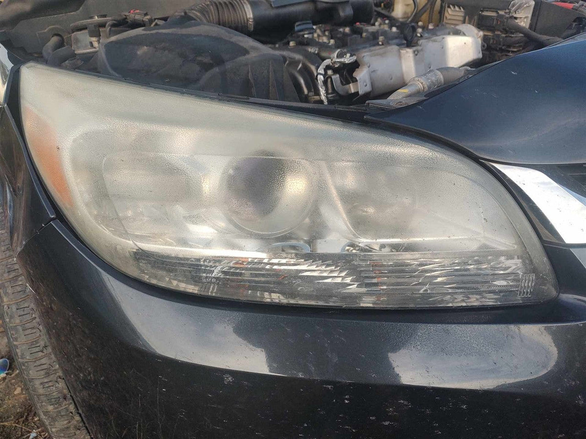 Headlight Assembly from a 2015 Chevrolet Malibu, right side, photo 1