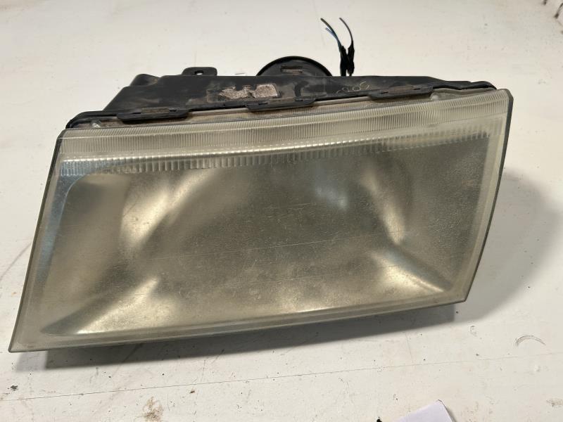 Headlight Assembly from a 2006 Mercury, left side, photo 1