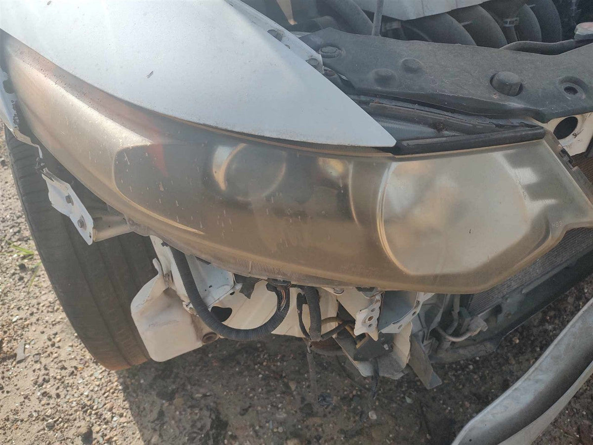 Headlight Assembly from a 2012 Acura TSX, right side, photo 1