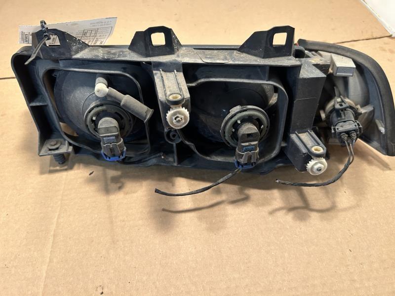 Headlight Assembly from a 1996 BMW 328i, right side, photo 3