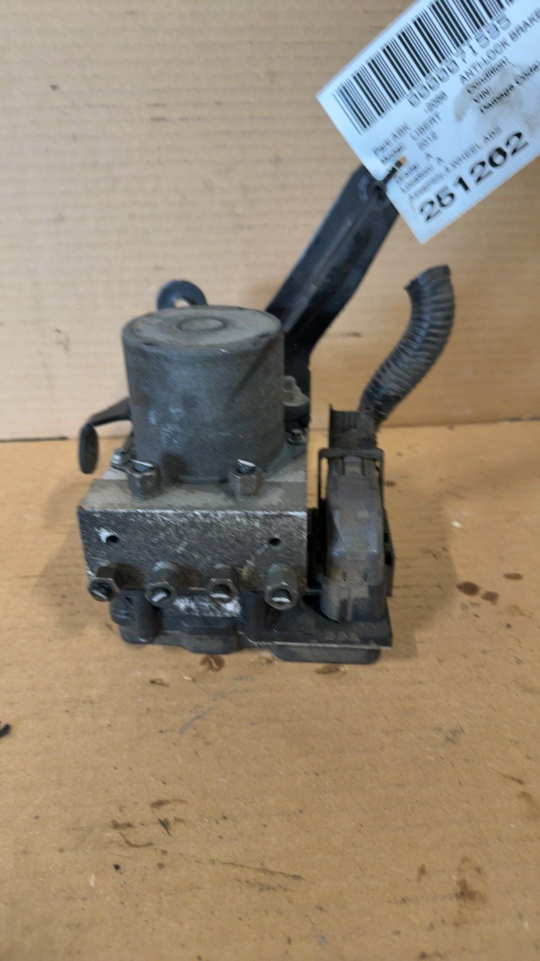 ABS Pump Module from a 2012 Jeep Liberty, photo 1