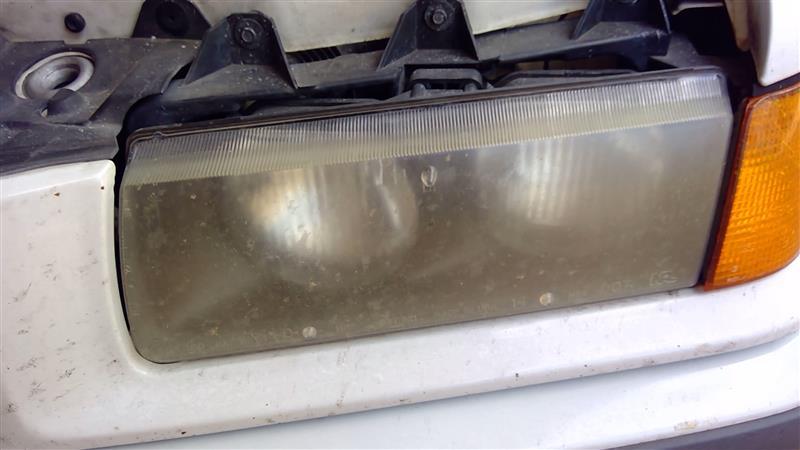 Headlight Assembly from a 1996 BMW 328i, left side, photo 1