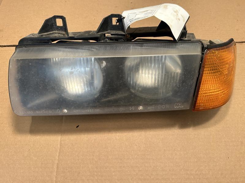 Headlight Assembly from a 1996 BMW 328i, left side, photo 2