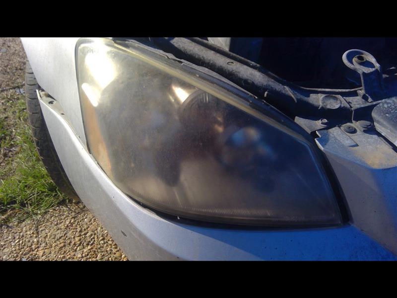Headlight Assembly from a 2005 Nissan Altima, right side, photo 1