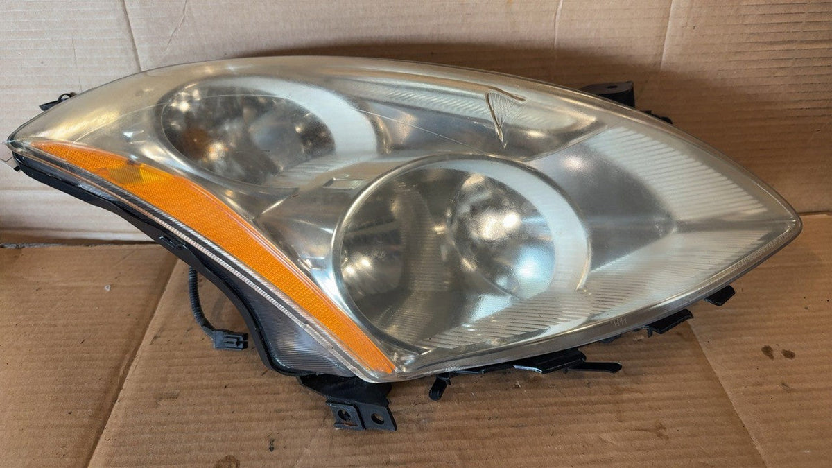 Headlight Assembly from a 2010 Nissan Altima, right side, photo 2