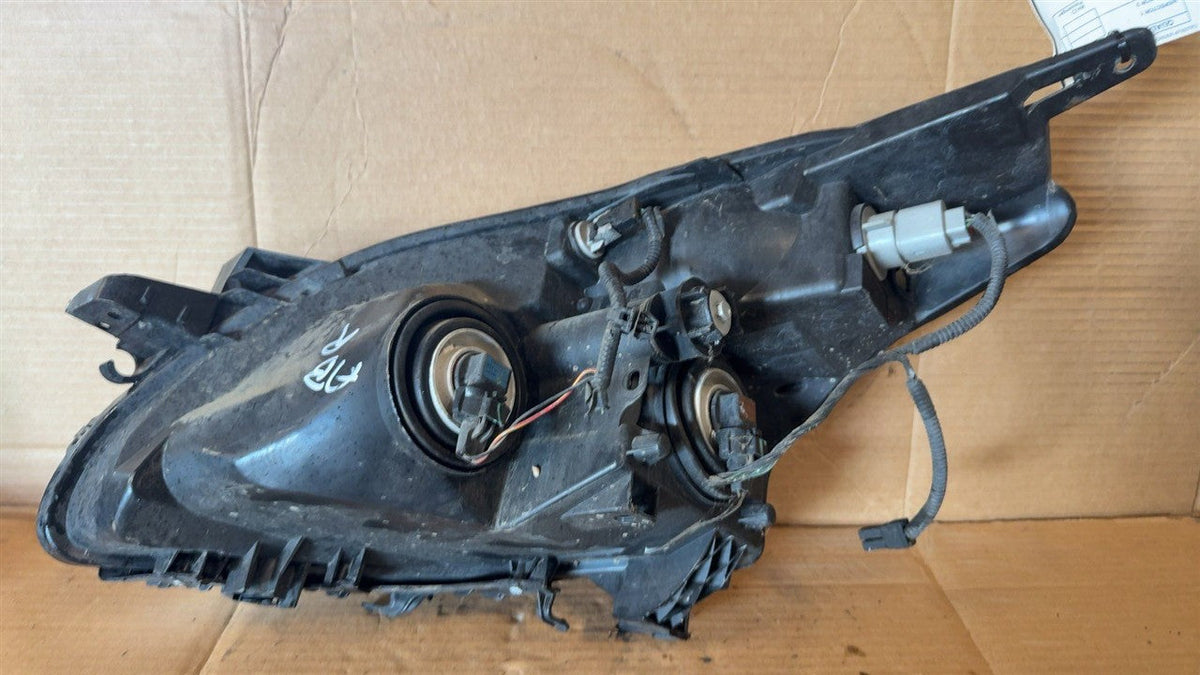 Headlight Assembly from a 2010 Nissan Altima, right side, photo 3