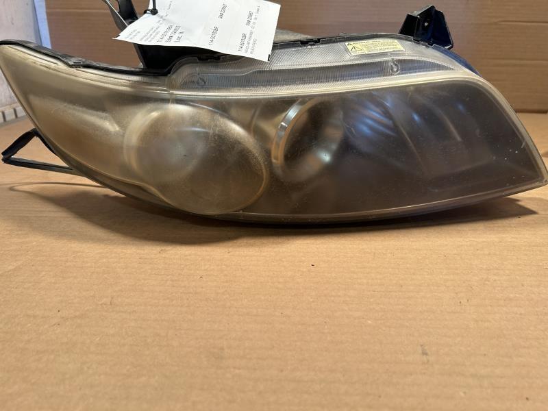 Headlight Assembly from a 2006 Infiniti, right side, photo 1