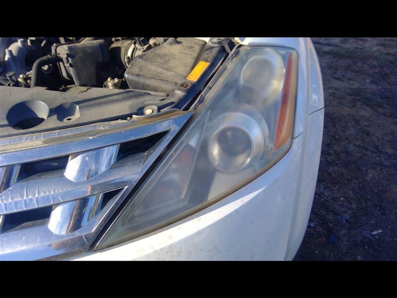 Headlight Assembly from a 2004 Nissan Murano, left side, photo 1