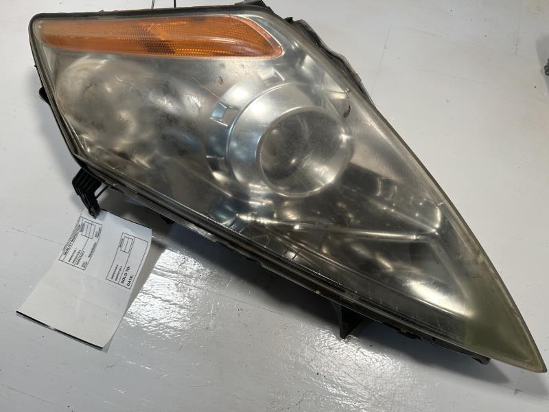 Headlight Assembly from a 2004 Nissan Murano, left side, photo 2