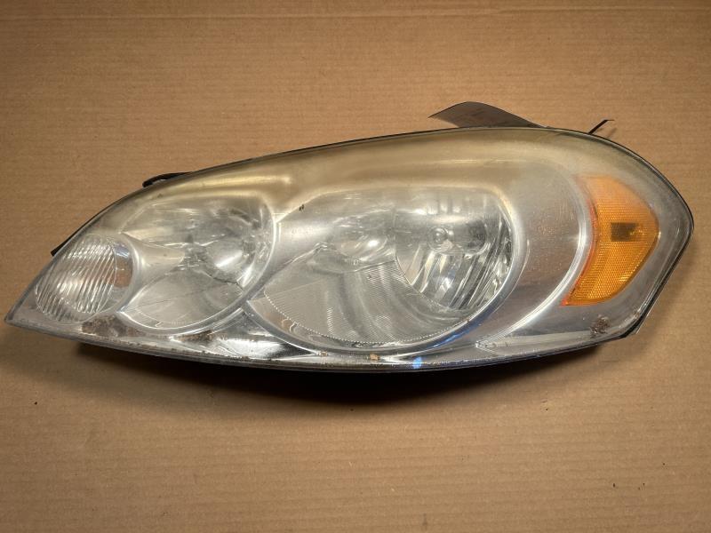 Headlight Assembly from a 2014 Hyundai Santa Fe, left side, photo 1