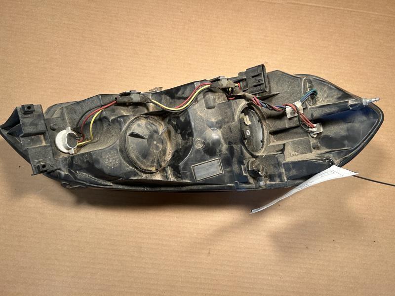 Headlight Assembly from a 2014 Hyundai Santa Fe, left side, photo 2
