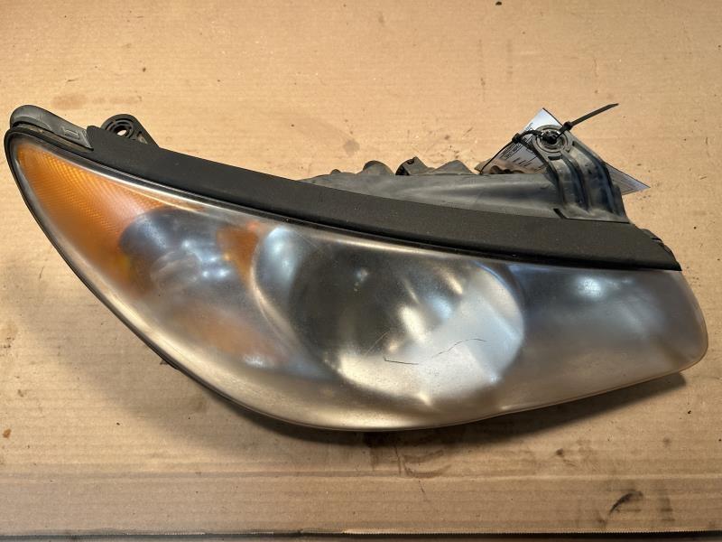 Headlight Assembly from a 2010 Hyundai Elantra, right side, photo 1