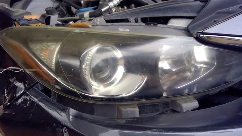 Headlight Assembly from a 2014 Mazda 3, right side, photo 1