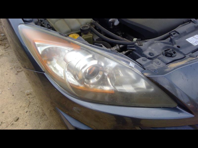 Headlight Assembly from a 2011 Mazda 3, right side, photo 1