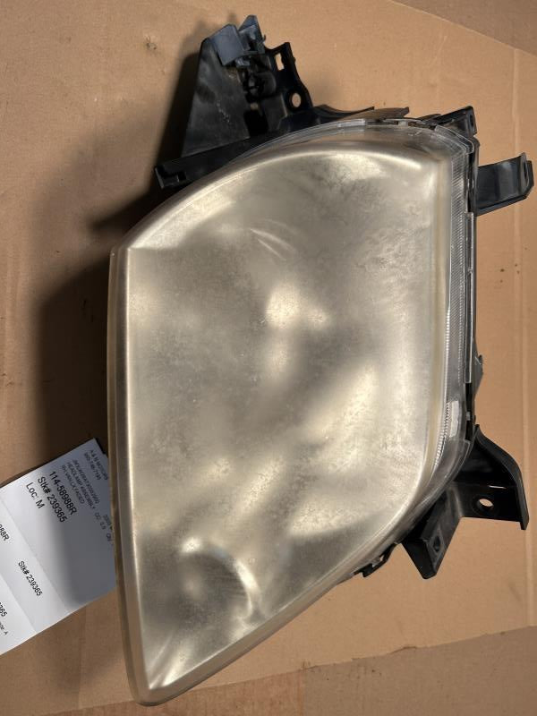 Headlight Assembly from a 2003 Mazda MPV, right side, photo 2