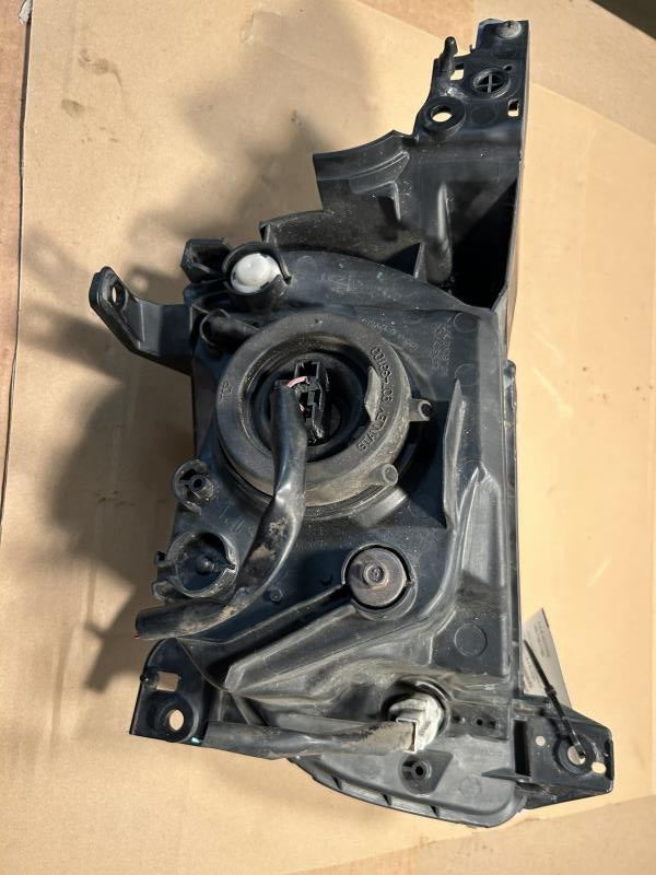 Headlight Assembly from a 2003 Mazda MPV, right side, photo 3