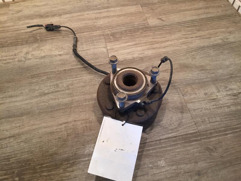 Wheel Hub from a 2012 Ram 1500, front, photo 1
