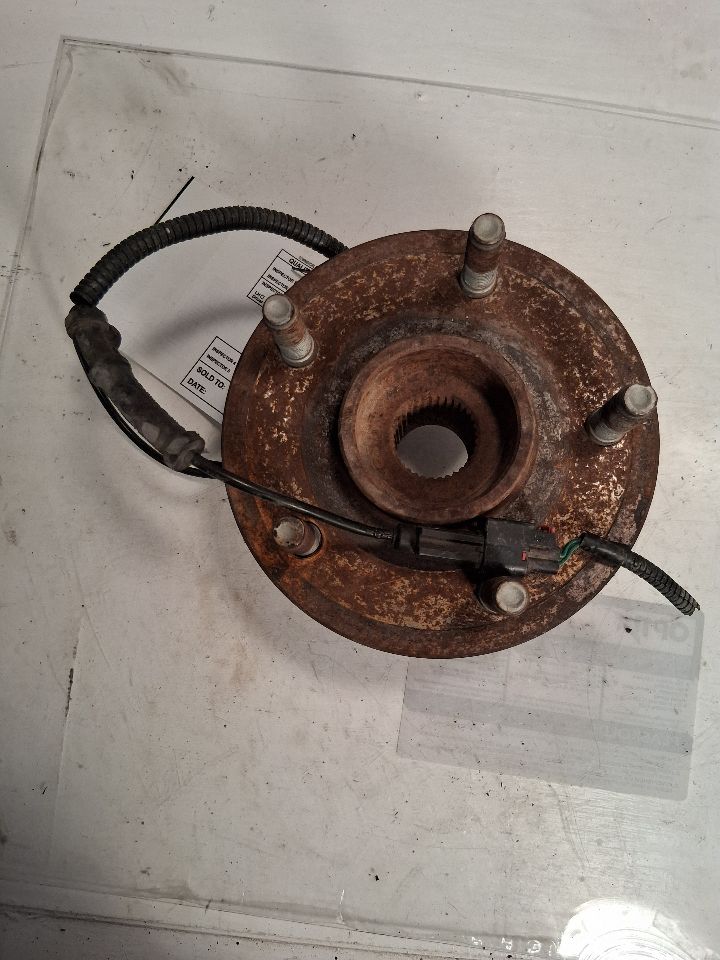 Wheel Hub from a 2012 Ram 1500, front, photo 4