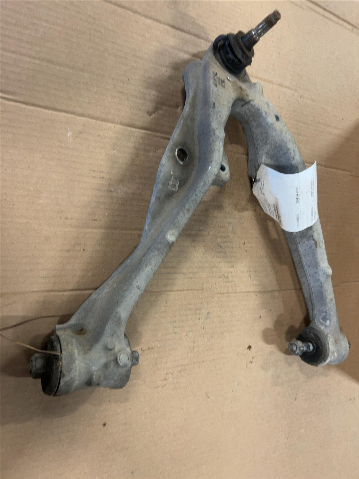Lower Control Arm from a 2010 Chevrolet Tahoe, front, left side, photo 1