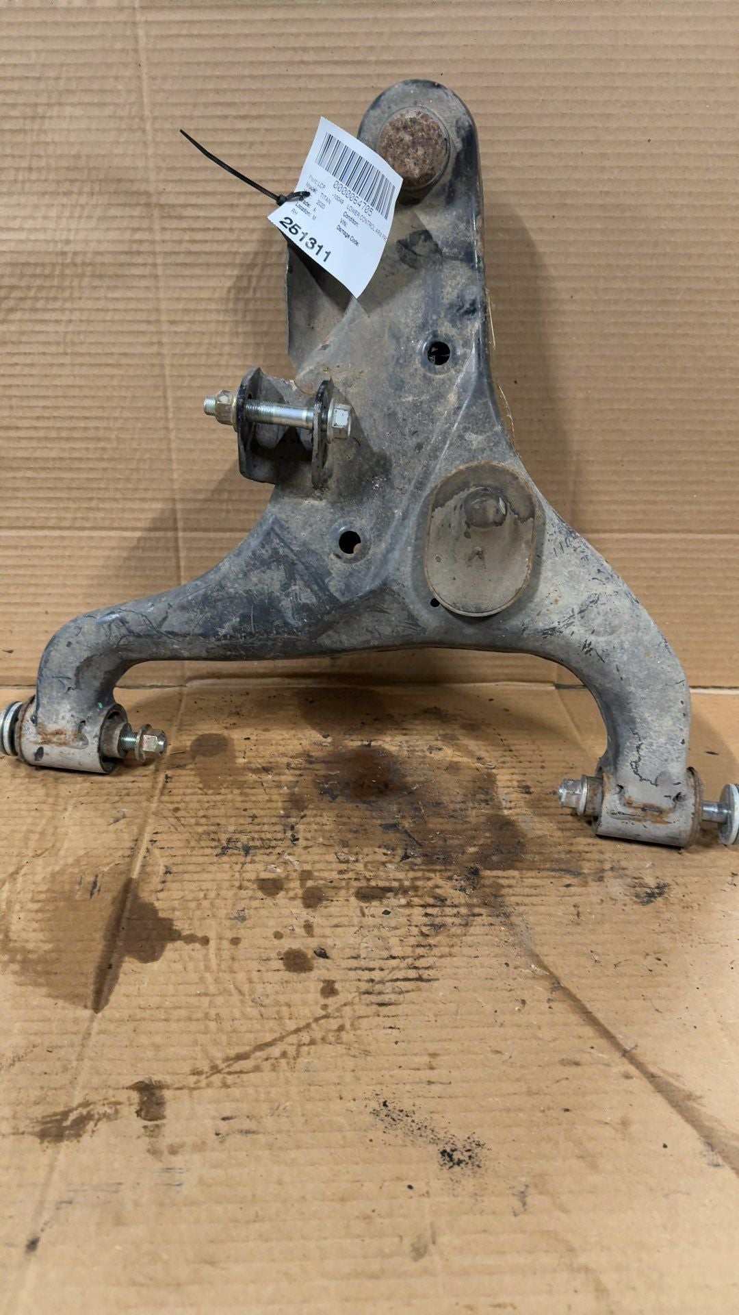 Lower Control Arm from a 2020 Nissan Titan, front, right side, photo 1