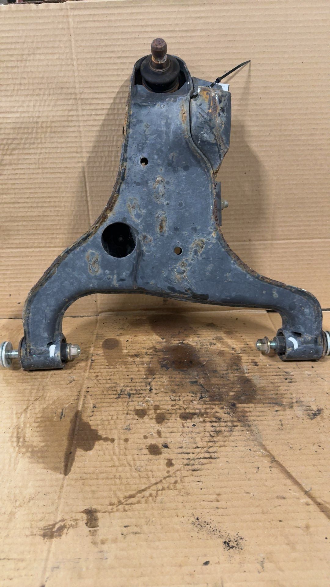 Lower Control Arm from a 2020 Nissan Titan, front, right side, photo 2
