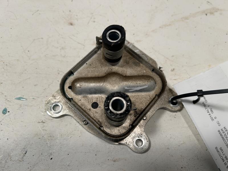 Engine Oil Cooler from a 2014 Nissan Altima, photo 1