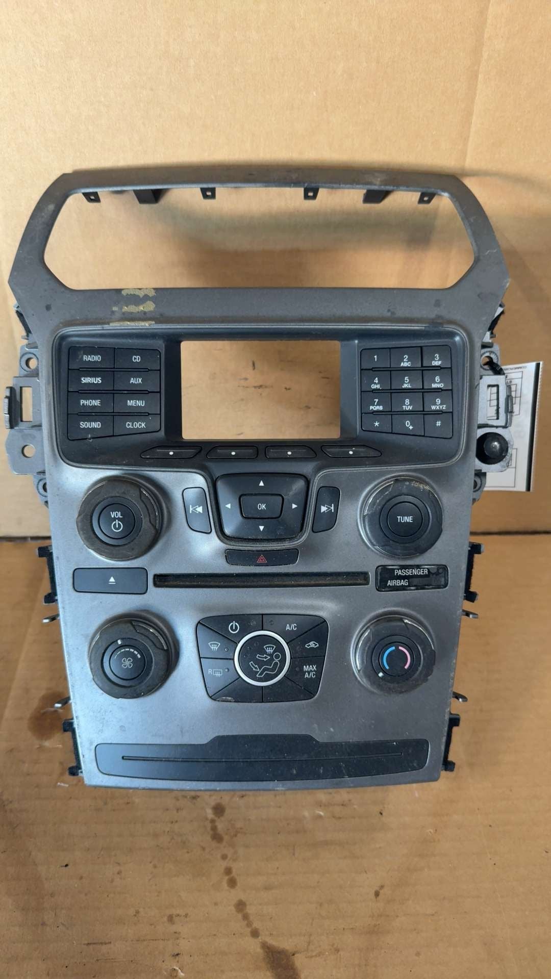 Radio Control Panel from a 2014 Ford Explorer, photo 1
