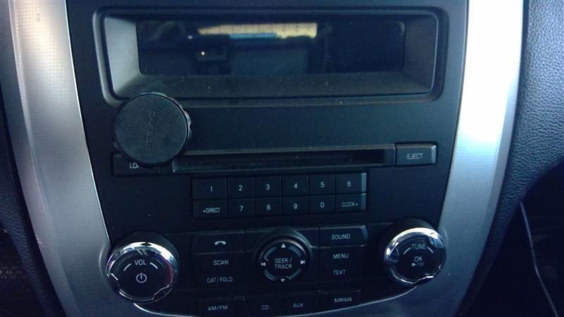 Radio Control Panel from a 2012 Ford Fusion, photo 1