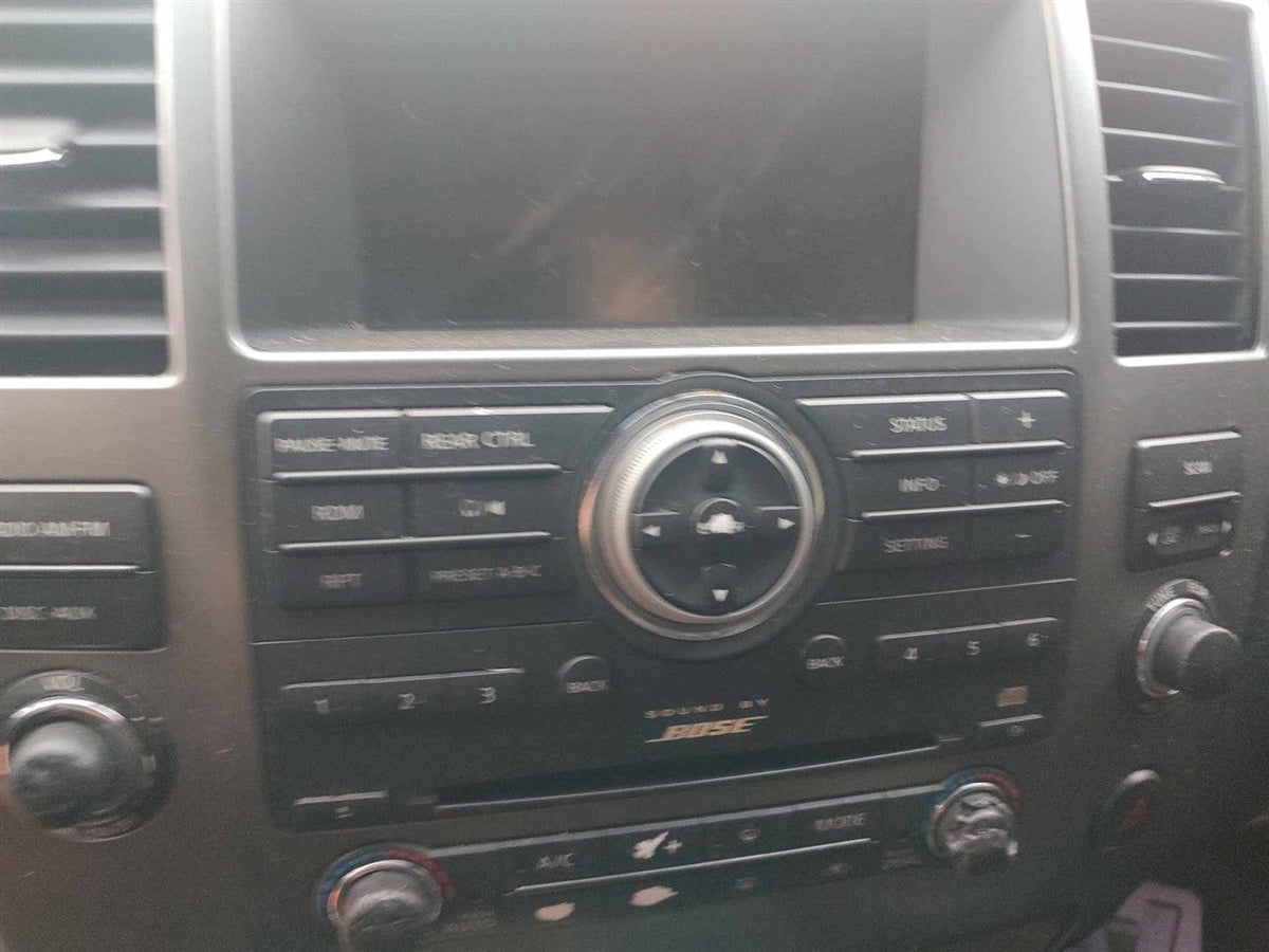 Audio and Climate Control Panel from a 2009 Nissan Armada, photo 1