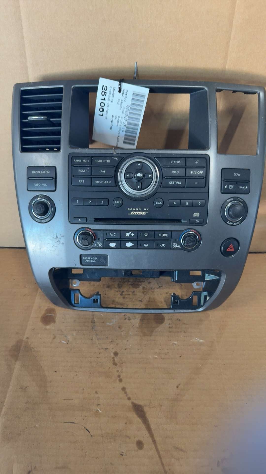 Audio and Climate Control Panel from a 2009 Nissan Armada, photo 2