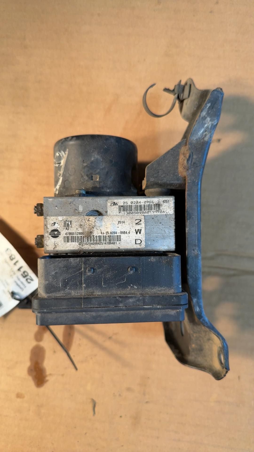 ABS Pump Module from a 2004 Nissan Frontier, photo 1