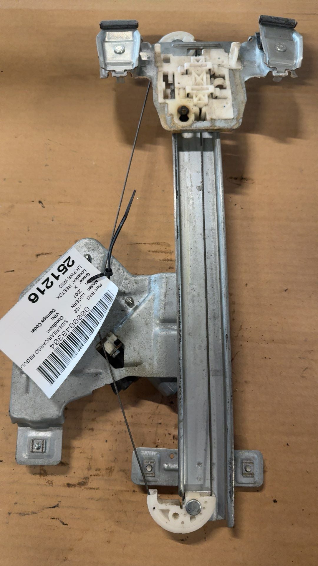 Window Regulator from a 2007 Buick Lucerne, rear, left side, photo 1