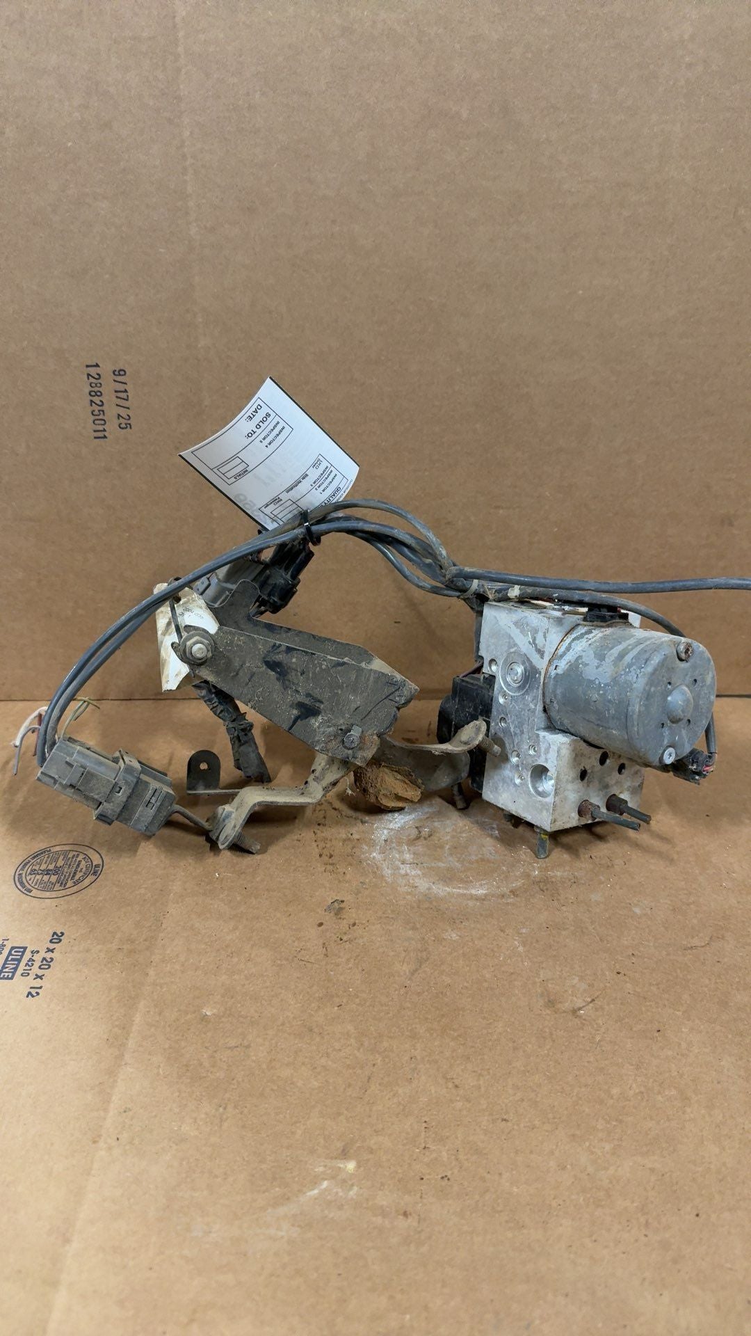 ABS Pump Module from a 2004 Infiniti G35, photo 1